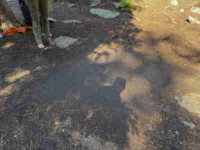 Under our tent, where the puddle was