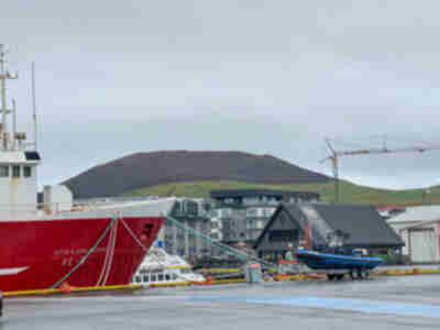 Looking at the Eldfell volcano from the ferry terminal