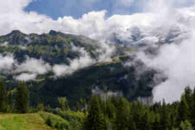 Glimpses of Jungfrau and Eiger through the clouds