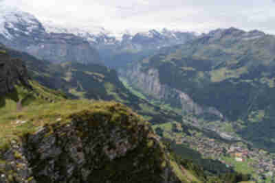 Looking down on both Wengen and Lauterbrunnen from high up on Männlichen (and Mürren is visible in the far distance on the cliff)