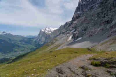 Descending the Eiger Trail to Alpiglen with Grindelwald in the distance