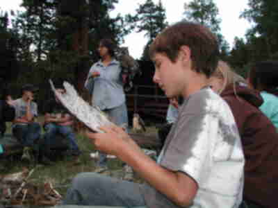 Ben looking at an owl wing