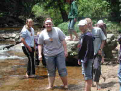 Exploring the stream in bare feet (brrr!)