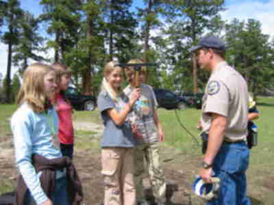 Allison trying to locate the radio collar.