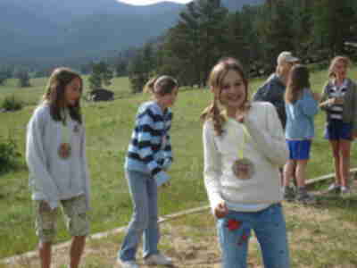 Sarah and Megan playing volleyball during Handraising