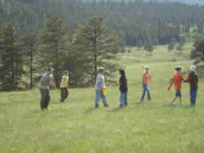 Brett getting ready to pass the frisbee during a game of Ultimate played during Handraising