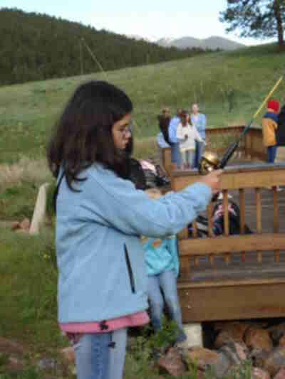Caitie casting the rod out