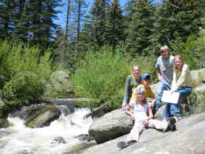 Madelyn, Matt, Amber, Brett and Ali hanging out by the river during the Scavenger Hunt