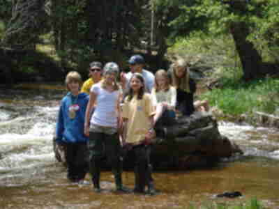 Playing in a shallow area of the stream after lunch