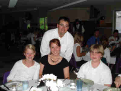 Madelyn, Kayla and Brett with their server "Enrique"