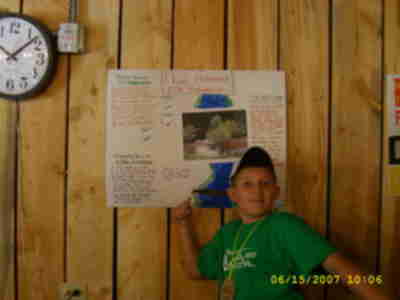 Dakota with his poster on Healthy Fish Habitat