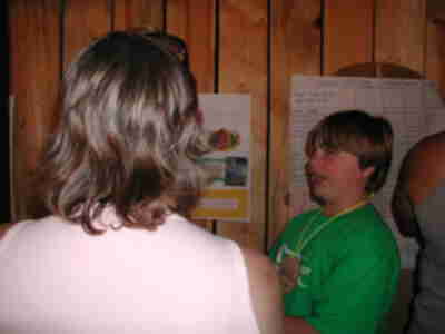 Brett explaining how Electrofishing works and is used by Wildlife Managers