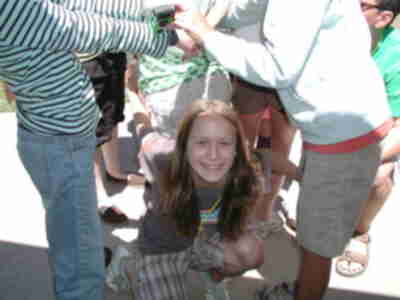 Steph attempts to free herself from the human knot