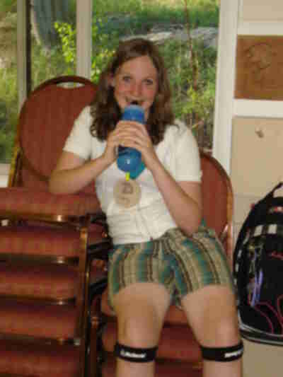 Carly waits while the floors get mopped