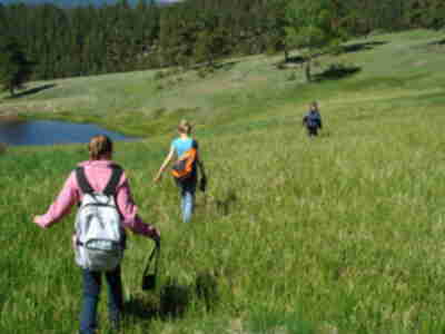 Janie, Jessica and Izzy walk 300 meters to the next point on the Point Count Survey