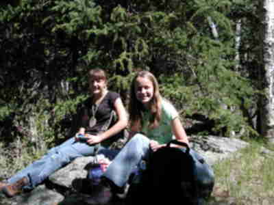 Destiny and Steph looking and listening for birds during the Point Count Survey