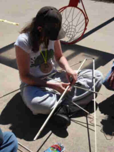 Carly working on the bird tail for Andrew