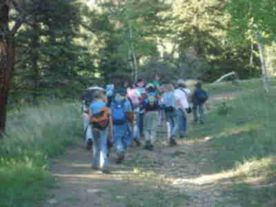 Hiking up to the Upper Meadow for the campout.