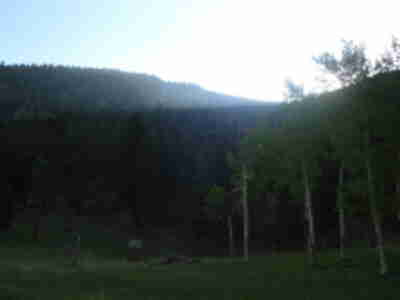 Looking east from the Upper Meadow with the outhouse in view.