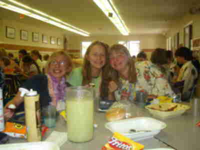 Erin, Steph and Mackenzie enjoying their luau dinner