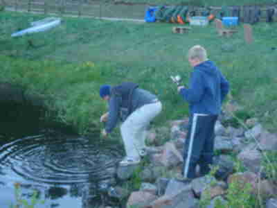 Aaron releasing the rainbow trout that Dylan caught