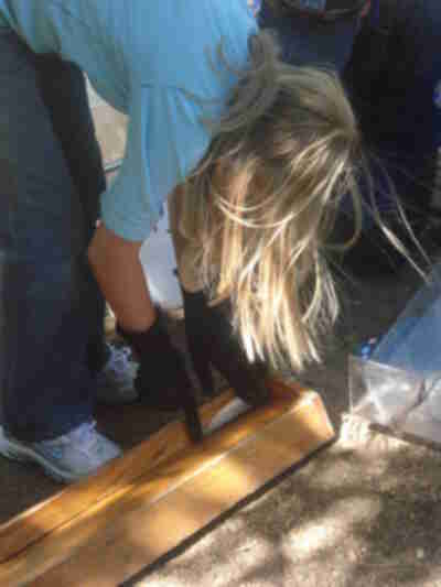 Jessica measuring a fish