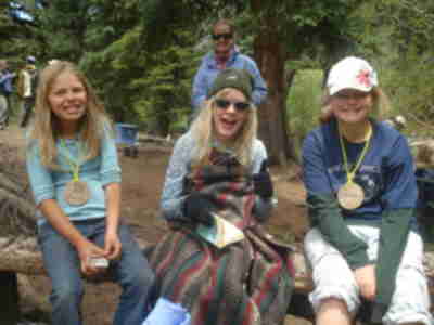 Laura warming up on the side of the creek with Jessica and Elizabeth